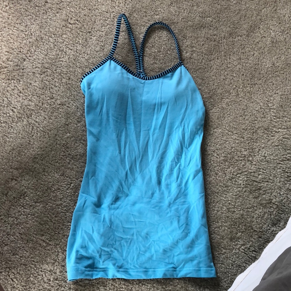 Blue LULULEMON top.
